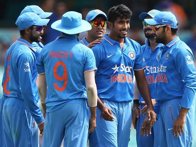 India's Jasprit Bumrah, second right, celebrates with Umesh Yadav and teammates after taking the wicket of Australia's Steve Smith during their one-day international cricket match in Sydney on January 23, 2016. (AP Photo) India's Jasprit Bumrah, second right, celebrates with Umesh Yadav and teammates after taking the wicket of Australia's Steve Smith during their one-day international cricket match in Sydney on January 23, 2016. (AP Photo)