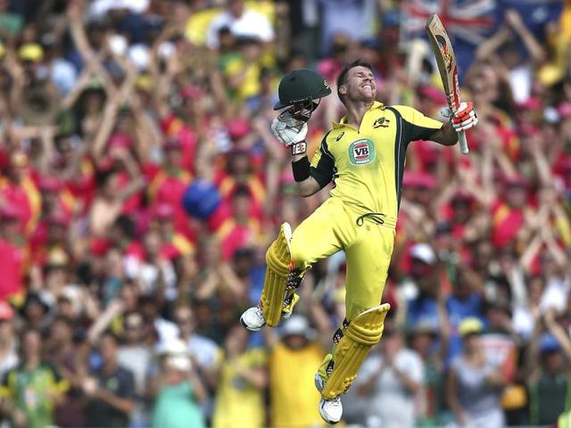 Australia's David Warner leaps into the air as he celebrates after hitting a century against India. (AP Photo) Australia's David Warner leaps into the air as he celebrates after hitting a century against India. (AP Photo)