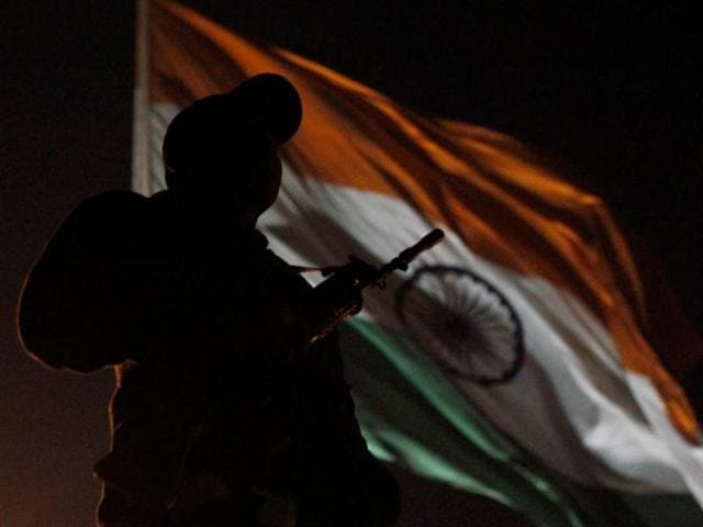 A commando on security vigil at the Rajpath during rehearsal for Republic Day parade in New Delhi.(HT Photo/Vipin Kumar)