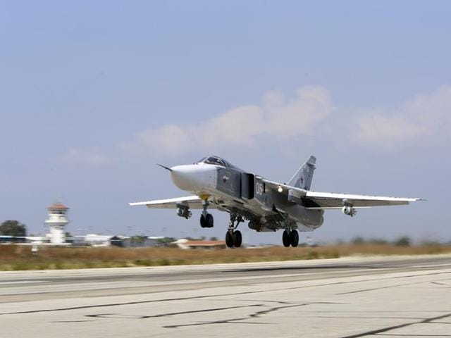 In this file photo, a Russian SU-24M jet fighter armed with laser guided bombs takes off from a runaway at Hmeimim airbase in Syria. (AP) In this file photo, a Russian SU-24M jet fighter armed with laser guided bombs takes off from a runaway at Hmeimim airbase in Syria. (AP)