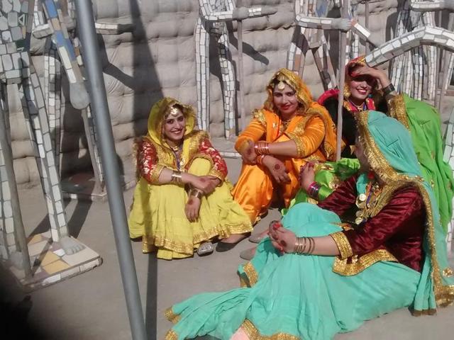 Young girls dressed up in traditional Punjabi dresses all set to perform at Rock Garden on Sunday.