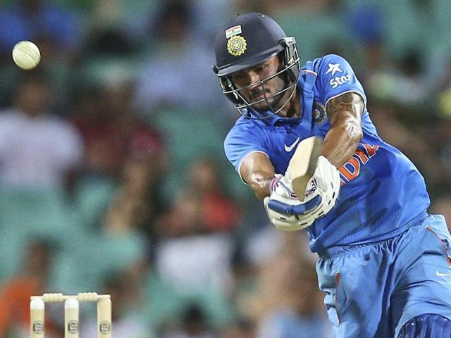 Manish Pandey kisses his helmet after hitting a century during their ODI match against Australia in Sydney. (AP Photo) Manish Pandey kisses his helmet after hitting a century during their ODI match against Australia in Sydney. (AP Photo)