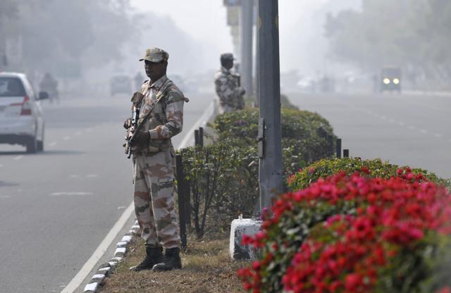 Security personal deployed on VIP route at Sector 9/10 dividing road in Chandigarh. (Ravi Kumar/HT Photo) Security personal deployed on VIP route at Sector 9/10 dividing road in Chandigarh. (Ravi Kumar/HT Photo)