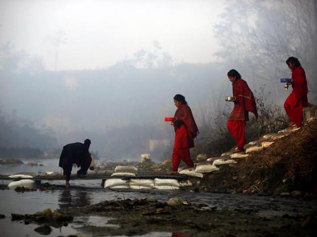 Unmarried women pray to get a good husband while those married pray for the longevity of their husbands by observing a month-long fast. (Navesh Chitrakar/Reuters) Unmarried women pray to get a good husband while those married pray for the longevity of their husbands by observing a month-long fast. (Navesh Chitrakar/Reuters)