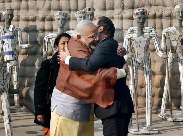 French President Francois Hollande is greeted by Prime Minister Narendra Modi at the Rock Garden of Chandigarh on Tuesday. (PTI) French President Francois Hollande is greeted by Prime Minister Narendra Modi at the Rock Garden of Chandigarh on Tuesday. (PTI)