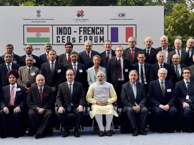 Prime Minister Narendra Modi with French President Francois Hollande at the Indo- French CEOs meeting in Chandigarh on Sunday. (PTI)