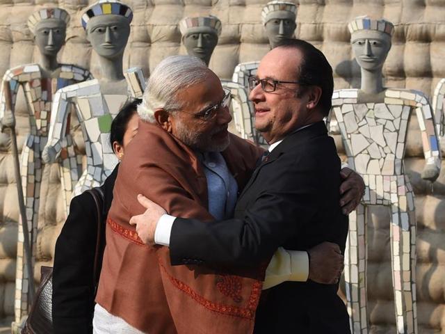 Prime Minister Narendra Modi hugs French President Francois Hollande upon his arrival at the Rock Garden in Chandigarh. (AFP)
