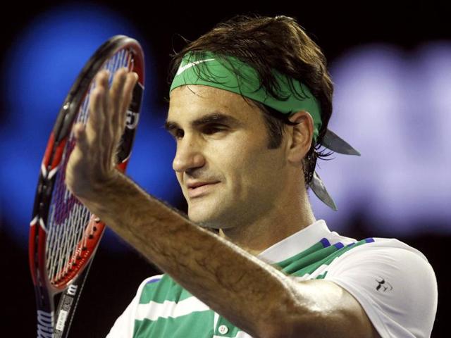 Roger Federer of Switzerland celebrates after defeating David Goffin of Belgium in their fourth round match.(AP Photo)