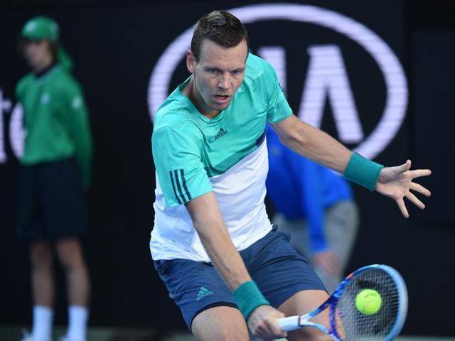 Czech Republic's Tomas Berdych plays a backhand return during his men's singles match against Spain's Roberto Bautista Agut. (AFP Photo) Czech Republic's Tomas Berdych plays a backhand return during his men's singles match against Spain's Roberto Bautista Agut. (AFP Photo)
