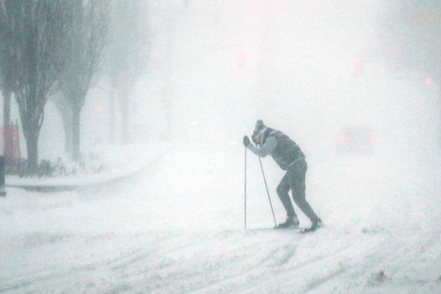 A man use a skiing on a snow covered street in Manhattan in New York. (AFP)