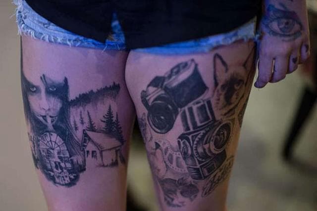 A woman shows her thighs tatooed during the Tatoo Week internacional tatoo and piercing meeting. (AFP) A woman shows her thighs tatooed during the Tatoo Week internacional tatoo and piercing meeting. (AFP)