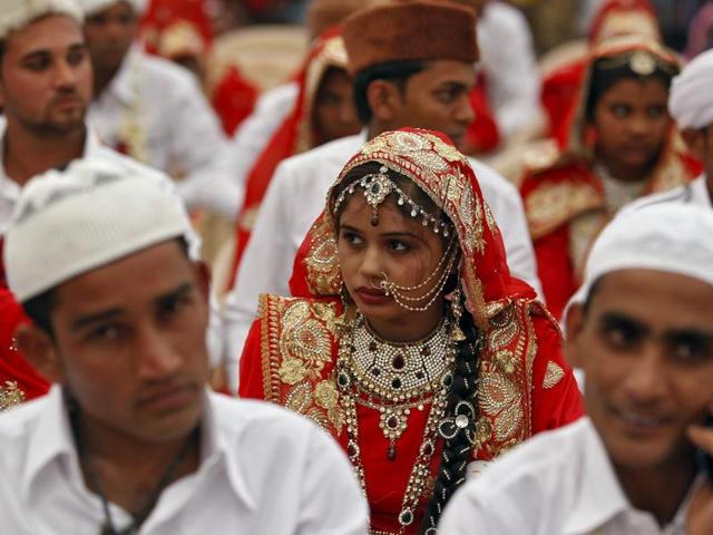 A total of 111 Muslim couples from various parts of Ahmedabad took their wedding vows on Friday during the mass marriage ceremony organised by a Muslim voluntary organisation, organisers said. (REUTERS)