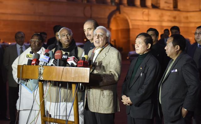 Congress senior leader gulam Nabi azad , Kapil Sibal , Mallikarjun Kharge , Arunachal Pradesh chief minister Nabam Tuki after meeting with President Pranab Mukherjee interact with the media.(Raj K Raj/HT)