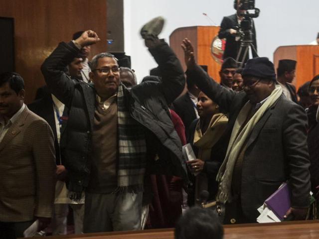 Nepalese lawmakers stage a protest as other lawmakers vote a constitution amendment bill in Kathmandu on Saturday.(AFP) Nepalese lawmakers stage a protest as other lawmakers vote a constitution amendment bill in Kathmandu on Saturday.(AFP)