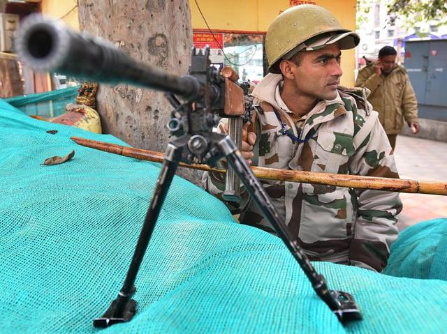 Security personnel have been stationed at numerous locations within a 2km radius of Rajpath, ahead of the Republic Day parade. (Raj K Raj / HT Photo)