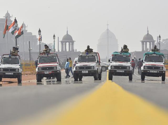Delhi Police personnel patrol at Rajpath as India gears up to celebrate its 67th Republic Day. (Ravi Choudhary/ HT Photo)