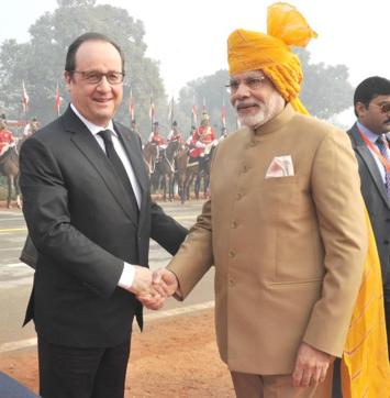 Prime Minister Narendra Modi with French President Francois Hollande, the chief guest at the 67th Republic Day parade at Rajpath in New Delhi on Tuesday. (PTI) Prime Minister Narendra Modi with French President Francois Hollande, the chief guest at the 67th Republic Day parade at Rajpath in New Delhi on Tuesday. (PTI)