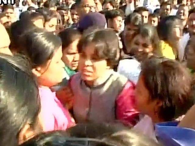 Women protesters clash with police personnel outside Shani Shinagpur temple in Ahmednagar, Maharashtra. (ANI Photo) Women protesters clash with police personnel outside Shani Shinagpur temple in Ahmednagar, Maharashtra. (ANI Photo)