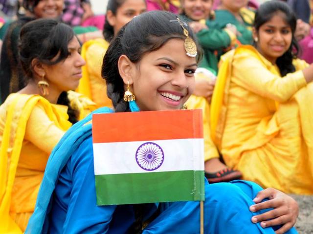 School girl in jubilant mood during the 67th Republic Day celebrating at YPS Stadium in Patiala . (Bharat Bhushan/HT Photo) School girl in jubilant mood during the 67th Republic Day celebrating at YPS Stadium in Patiala . (Bharat Bhushan/HT Photo)