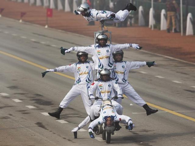 Motorcycle display team of Indian Army's 'Corps of Signals', popularly known as 'Dare Devils', make a formation on a motorcycle as they roll down Rajpath during the Republic Day parade in New Delhi. (AP Photo) 