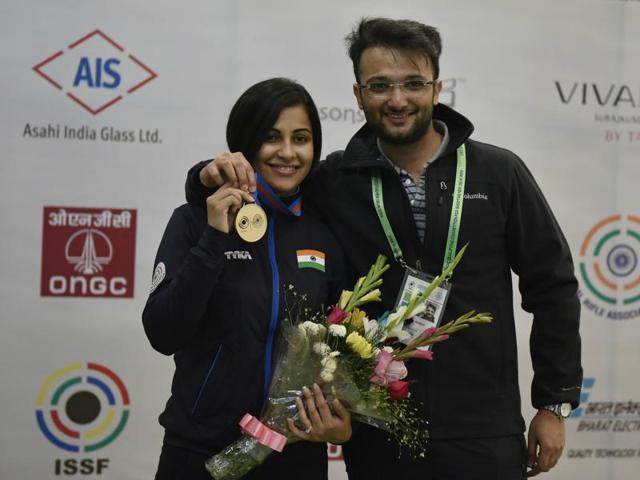 With her husband and coach Ronak Pandit, Sidhu celebrates her gold medal. (Ravi Choudhary/ HT Photo) With her husband and coach Ronak Pandit, Sidhu celebrates her gold medal. (Ravi Choudhary/ HT Photo)