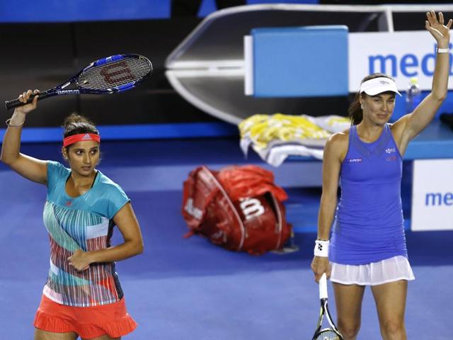 Martina Hingis, right, plays a shot as partner Sania Mirza looks on during their semifinal match against Julia Goerges and Karolina Pliskova of the Czech Republic at the Australian Open tennis championships in Melbourne, Australia, Wednesday, Jan. 27, 2016. The Indo-Swiss pair won the semis to make way to the finals. (AP) Martina Hingis, right, plays a shot as partner Sania Mirza looks on during their semifinal match against Julia Goerges and Karolina Pliskova of the Czech Republic at the Australian Open tennis championships in Melbourne, Australia, Wednesday, Jan. 27, 2016. The Indo-Swiss pair won the semis to make way to the finals. (AP)