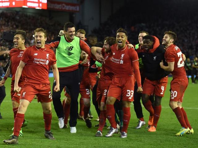 Liverpool celebrate after Joe Allen (not pictured) scores the penalty to win the penalty shootout in the League Cup semifinal second leg against Stoke City at anfield on January 26, 2015. (Reuters Photo) Liverpool celebrate after Joe Allen (not pictured) scores the penalty to win the penalty shootout in the League Cup semifinal second leg against Stoke City at anfield on January 26, 2015. (Reuters Photo)