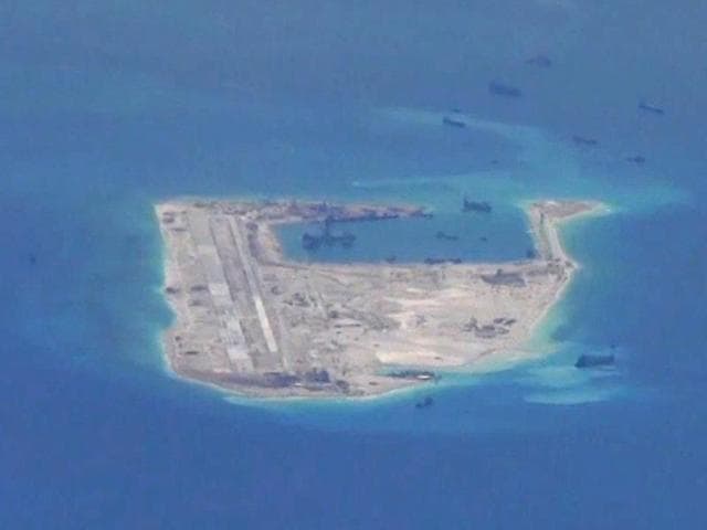 Chinese vessels are purportedly seen in the waters around Fiery Cross Reef in the disputed Spratly Islands in the South China Sea in this still image provided by the US Navy. China is planning to build a floating nuclear power station as it seeks to double its atomic capacity by 2020.(Reuters File Photo) Chinese vessels are purportedly seen in the waters around Fiery Cross Reef in the disputed Spratly Islands in the South China Sea in this still image provided by the US Navy. China is planning to build a floating nuclear power station as it seeks to double its atomic capacity by 2020.(Reuters File Photo)