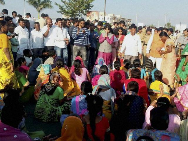 Supporters of Shani Shingnapur gathered at temple to support trust of temple at Ahmadnagar district on Tuesday. (PTI) Supporters of Shani Shingnapur gathered at temple to support trust of temple at Ahmadnagar district on Tuesday. (PTI)