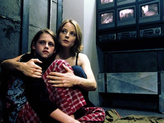 Panic Room (2002): A divorced woman and her diabetic daughter take refuge in their newly-purchased house’s safe room, when three men break-in, searching for a missing fortune.