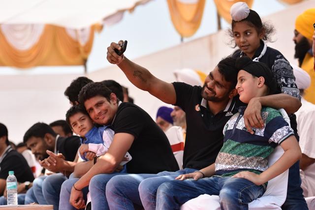 During a visit to a sports event in Belapur, young boys were grabbing the players with requests for selfies. (Photo: Aalok Soni/HT)