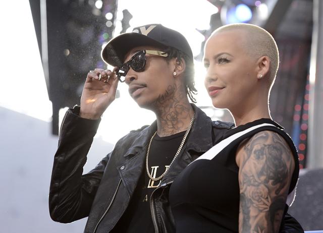 Rapper Wiz Khalifa, left, and Amber Rose arrive at the LA Premiere of the Fast & Furious 6 in Universal City, Calif. Rose filed for divorce from Khalifa on Sept 23, 2014, in Los Angeles. (Dan Steinberg/Invision/AP) Rapper Wiz Khalifa, left, and Amber Rose arrive at the LA Premiere of the Fast & Furious 6 in Universal City, Calif. Rose filed for divorce from Khalifa on Sept 23, 2014, in Los Angeles. (Dan Steinberg/Invision/AP)