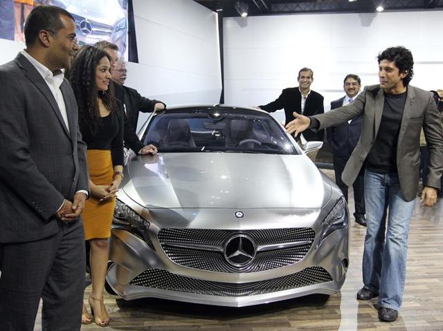 Actor Farhan Akhtar, Indian cricketer Irfan Khan and author Chetan Bhagat at the launch of Mercedes Concept-A during the 11th Auto Expo, 2012, at Pragati Maidan in New Delhi. (Raj K Raj/HT File Photo)