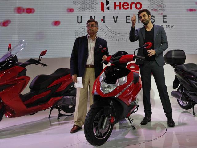 Hero MotoCorp’s chairman, MD and CEO Pawan Munjal with Ranbir Kapoor launch new bikes and scooters from Hero at the 12th Auto Expo, 2014 in Greater Noida. (Raj K Raj/HT File Photo)