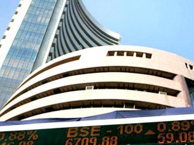 Stocks wrested some of their lost ground as they cut down their early losses, with the Sensex trading down by 27 points in view of the derivatives expiry for January. (HT File Photo) Stocks wrested some of their lost ground as they cut down their early losses, with the Sensex trading down by 27 points in view of the derivatives expiry for January. (HT File Photo)