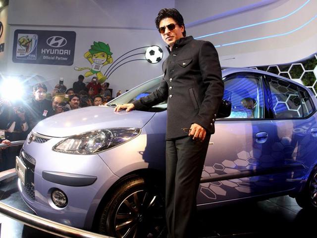 Bollywood actor Shahrukh Khan launching Hyundai i10 Electric at the 2010 Auto Expo in New Delhi. (Raj K Raj/HT File Photo)