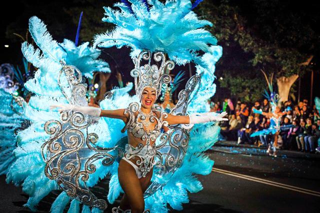 Dancers parade in the street during carnival in Santa Cruz, on the Spanish Canary island of Tenerife on February 14, 2015. (AFP) Dancers parade in the street during carnival in Santa Cruz, on the Spanish Canary island of Tenerife on February 14, 2015. (AFP)