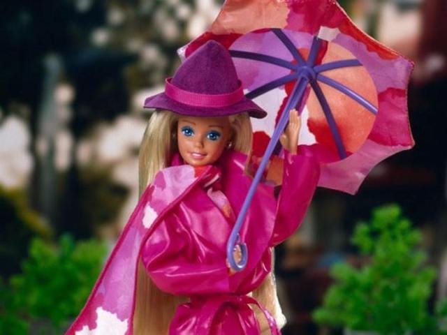 Barbie in 1989 wearing the perfect pink trench! (Mattel) 