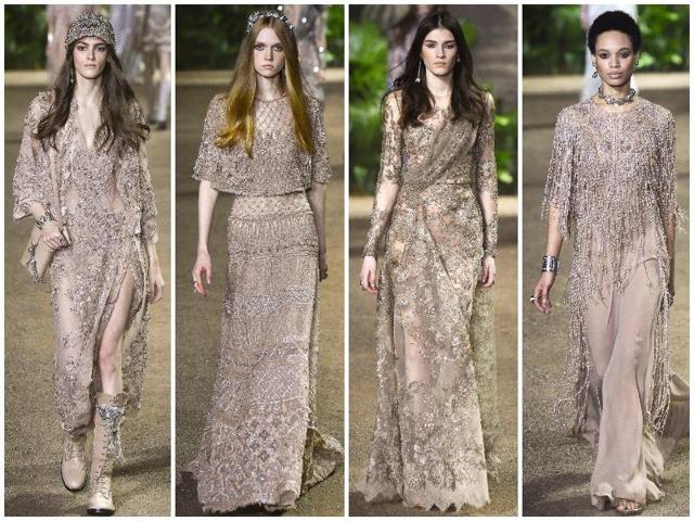 Some really different vibes seeped in late in the show when a model rolled out in full rock-star regalia: jeweled pants stuffed into boots, a crystalline camisole, and a matching coat that reached to the ground. The Beatles in India, maybe? (AFP/ AP/ Reuters) Some really different vibes seeped in late in the show when a model rolled out in full rock-star regalia: jeweled pants stuffed into boots, a crystalline camisole, and a matching coat that reached to the ground. The Beatles in India, maybe? (AFP/ AP/ Reuters)