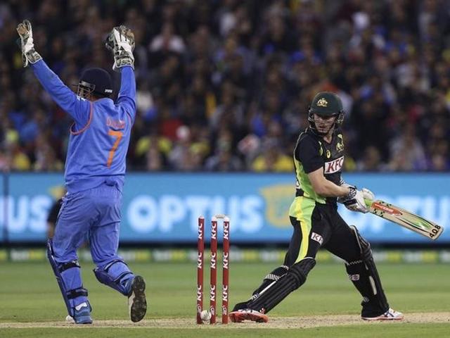 Australia's James Faulkner is out stumped after a ricochet from the leg of India's Mahendra Singh Dhoni. (Reuters Photo) Australia's James Faulkner is out stumped after a ricochet from the leg of India's Mahendra Singh Dhoni. (Reuters Photo)