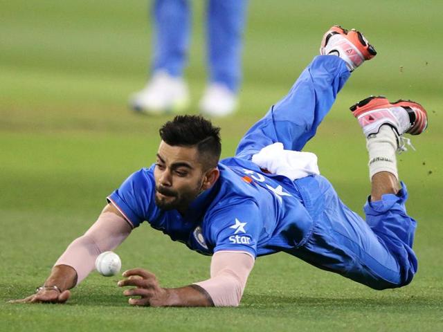 India's Virat Kohli dives to prevent a boundary. (AP Photo) India's Virat Kohli dives to prevent a boundary. (AP Photo)