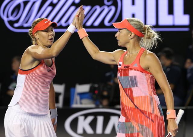 Czech Republic’s Andrea Hlavackova, right, and Lucie Hradecka celebrate a point win over Martina Hingis of Switzerland and Sania Mirza of India during the women's doubles final. (AP) Czech Republic’s Andrea Hlavackova, right, and Lucie Hradecka celebrate a point win over Martina Hingis of Switzerland and Sania Mirza of India during the women's doubles final. (AP)