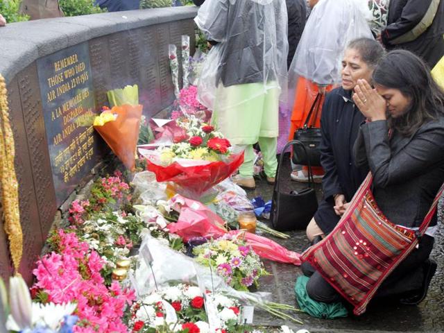 Victims’ relatives offering prayers at the Kanishka memorial on the 20th anniversary of the bombing in Ahakista, Cork, Ireland, on June 23, 2005.