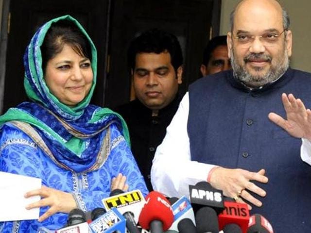 BJP president Amit Shah and PDP chief Mehbooba Mufti address a press conference in New Delhi.