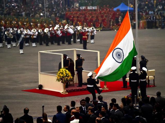 The national flag gets lowered as the Beating Retreat ceremony comes to an end. (Ajay Aggarwal/HT Photo)