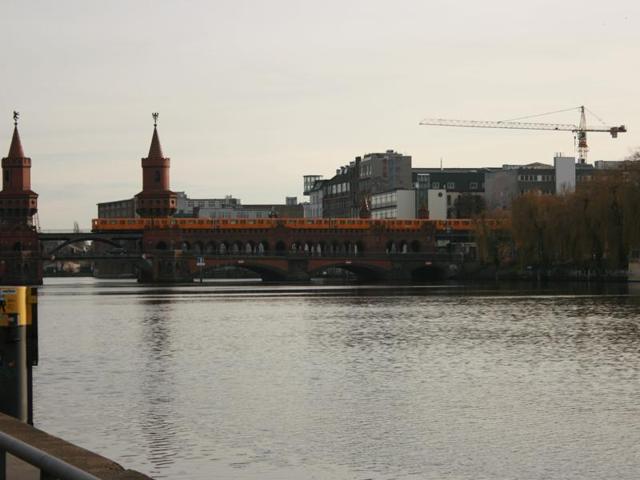 A view of the river Spree with the U-Bahn metro crossing over it. Berlin has an extensive public transportation networks, and its metro trains date back to the World War era. Some of the metro stations were even divided during the German divide after the fall of Nazism. (Picture courtesy: Mad Art Photography)