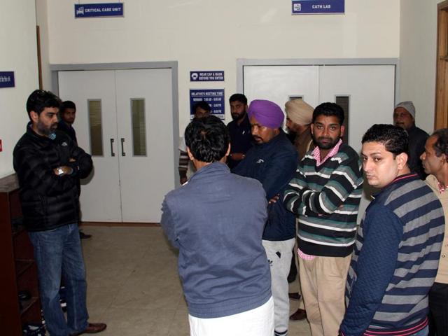 Relatives standing outside the ICU as Gurdas Singh Badal undergoes treatment at the Jindal Heart Institute in Bathinda on Saturday.(Sanjeev Kumar/HT Photo) Relatives standing outside the ICU as Gurdas Singh Badal undergoes treatment at the Jindal Heart Institute in Bathinda on Saturday.(Sanjeev Kumar/HT Photo)