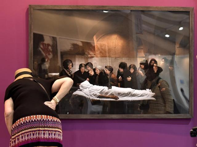 Visitors go through the art work being displayed at the India Art Fair NSIC grounds, Okhla Industrial Area, in New Delhi. (Raj K Raj/HT Photo) Visitors go through the art work being displayed at the India Art Fair NSIC grounds, Okhla Industrial Area, in New Delhi. (Raj K Raj/HT Photo)