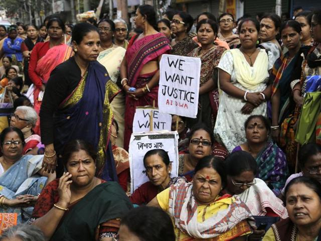 Women activists participate in a demonstration demanding highest punishment for convicted persons in the Kamduni rape case and the re-arrest of two acquitted persons near the city court in Kolkata. (AP) Women activists participate in a demonstration demanding highest punishment for convicted persons in the Kamduni rape case and the re-arrest of two acquitted persons near the city court in Kolkata. (AP)