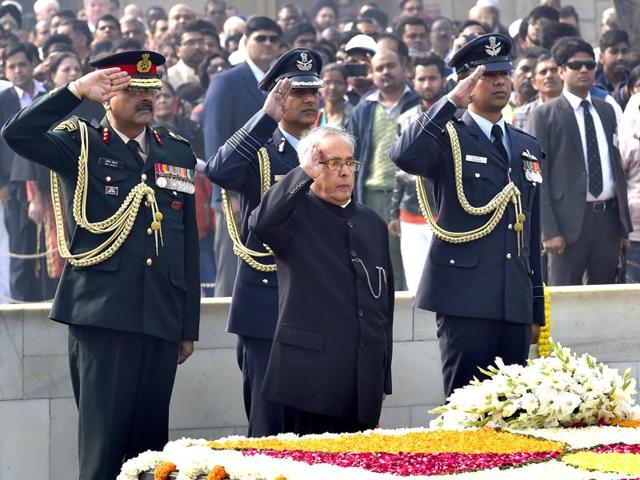 President Pranab Mukherjee salutes as he pays homage at Mahatma Gandhi’s memorial, on Martyrs' Day marking the 68th anniversary of Gandhi's assassination in New Delhi. (Ajay Aggarwal/HT Photo) President Pranab Mukherjee salutes as he pays homage at Mahatma Gandhi’s memorial, on Martyrs' Day marking the 68th anniversary of Gandhi's assassination in New Delhi. (Ajay Aggarwal/HT Photo)